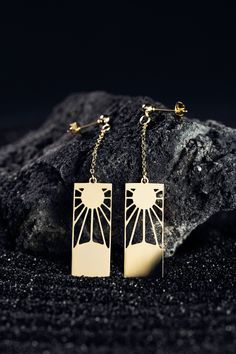 Hanafuda earrings have traditionally been passed down through generations, and the significance of these earrings runs even deeper. Rumored to be a secret mark of the Breath of the Sun style, we hope you embody the strength and courage that these earrings represent. Materials: 18K Gold Plated Brass, Stainless Steel Earring dimensions: Approx. 2.5" by 0.5" (including chain length). Each earring weighs approximately 3 grams (the weight of one penny) Anime Inspired Jewelry, Naruto Jewelry, Hanafuda Earrings, Afro Jewelry, Snake Ring Gold, Anime Earrings, Things I Need To Buy, Punk Earrings, Anime Jewelry