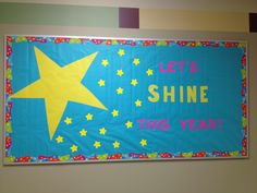 a bulletin board that says let's shine this year