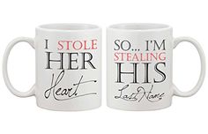 two white coffee mugs with the words i stole her and his last love written on them