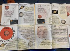 an open book with pictures of planets on it