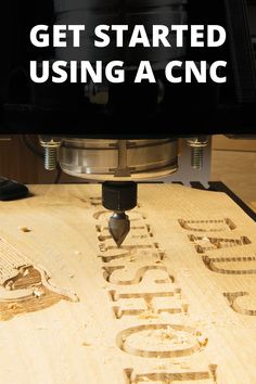 the words get started using a cnc are carved into wood