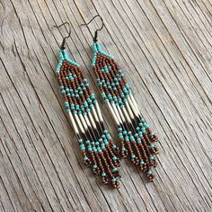 Native earrings of porcupine quills and japanese seed beads . For the Native American, the porcupine is an innocent child, a kind and loving personality . He teaches embrace the world with curiosity and to be free of serious adult world. Given the nature of the product, there may be a variation in the hue . When ordering , you can request a picture of the earrings to ship and I will send you for approval before shipping . Each of our creations is inspired by nature . Thank you and enjoy ! Porcupine Quill Earrings, Beading With Porcupine Quills, Quill Earrings Porcupine, Beaded Porcupine Quill Earrings, Porcupine Quill Jewelry, Porcupine Quills, Native American Earrings, Native Jewelry, Beaded Earrings Patterns