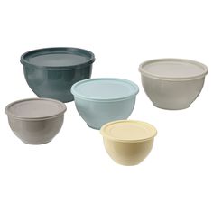 four bowls with lids are shown in different colors