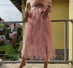 Tulle, ruffles, trend, sheer, transparent and fashion skirt.The skirt is unusual and asymmetrical. Below is the lining.Color: PinkSize: M, L, XlLenght: 38" Sheer Asymmetrical Evening Skirt, Evening Sheer Asymmetrical Skirt, Sheer Flowy Party Skirt, Sheer Flowy Skirt For Party, Sheer Skirt For Party, Feminine Stretch Skirt For Party, Feminine Asymmetrical Skirt For Party, Party Skirt With Sheer Details And Stretch, Party Sheer Skirt With Stretch