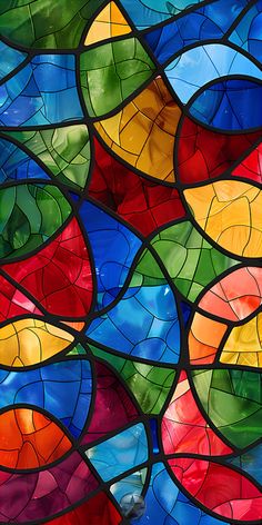 a colorful stained glass window with many different colors