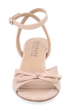 An ankle-strap sandal crafted from glossy faux leather offers sweet style with a dainty bow and kitten heel. 2" heel Synthetic upper, lining and sole Imported Nude Kitten Heel Shoes, Kitten Heel Shoes, Strap Sandals Women, Bow Heels, Shoes Vintage, Journee Collection, Sweet Style, Kitten Heel, Sandal Women