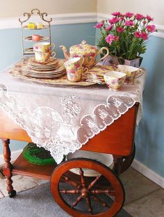 a table with plates and cups on it