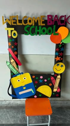 a chair made to look like a school bus with the words welcome back to school on it