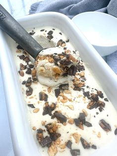 an ice cream dish with nuts and milk