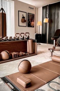 a living room filled with lots of exercise equipment