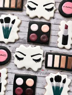 decorated cookies with makeup and eye shadows on them