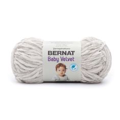 bernat baby velvett yarn ball in white, on a white background