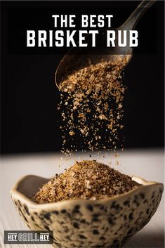 the best brisket rub is being spooned into a bowl