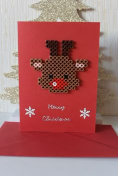 a christmas card with a reindeer on it