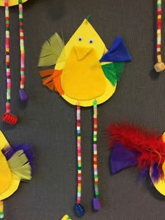 paper plate crafts with colorful feathers and hair clips