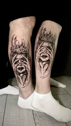 two people with tattoos on their legs, one has a crown and the other has an evil face