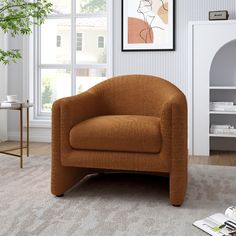 a brown chair sitting on top of a carpeted floor