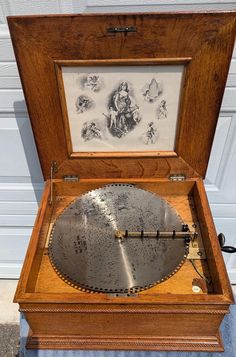 an old record player in a wooden case