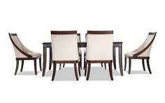 a dining room table and chairs with white fabric upholstered backrests on each side