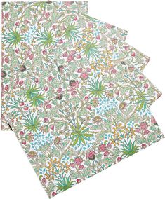 three pieces of paper with floral designs on them