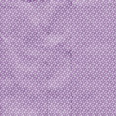 the fabric is purple and has small white dots on it