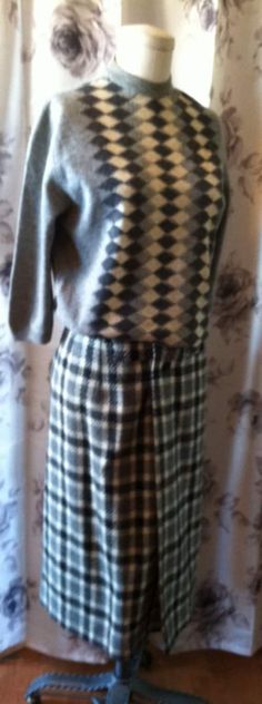 "This is a 1950 pencil wrap skirt of hounds tooth wool accompanied by Bobbie brooks 100% wool argyle sweater.  I found these two pieces together.  The sweater has a yellow marks or food stain,  I am sure with a dry clean it will come right out.  Sweater measures Bust 34-36\" Waist 28-30\" Sleeve  15\"  Skirt is a wrap around button front and two small pockets.  In photo it is on a size 6 mannequin. Measures: Waist: 24- 25\" Hip: 34 - 36\" Overall length: 29\"" Ugly Christmas Sweater Dress, Skirt And Sweater, Christmas Sweater Dress, Bobbie Brooks, Hounds Tooth, Womens Sweaters, Beige Cardigan, Argyle Sweater, Beige Sweater