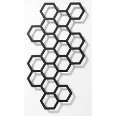 an abstract wall sculpture made out of hexagonal shapes, with the word slim on it