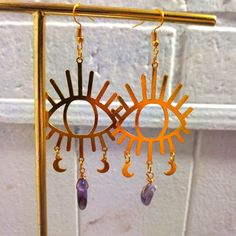 This Is A Pair Of Goldtone Eye And Crecent Moon Amethyst Chip Earrings. All Items Are Negotiable So Please Feel Free To Make An Offer Or Add To A Bundle For A Customized Discount. Spiritual Earrings, Chip Earrings, Free People Jewelry, Eye Earrings, Wrapped Jewelry, Wire Wrapped Jewelry, Purple Gold, Wire Wrapped, Gold Tones