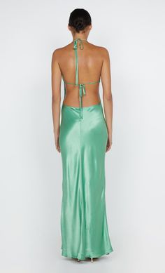 Designed in a flattering silhouette, the BEC + BRIDGE Zariah Halter Dress is cut from a lustrous fabric. The dress features a deep V and a statement halter neckline that ties above an open back. This product is certified Australian made. Green V-neck Halter Dress For Party, Satin Maxi Dress With Tie Back, Satin Tie Back Halter Dress For Cocktail, Silk Halter Neck Backless Dress For Gala, Silk Backless Tie Back Dress For Gala, Halter Neck Bias Cut Backless Dress For Gala, Backless Bias Cut Halter Neck Dress For Gala, Bias Cut Party Dress With Strappy Back, Bias Cut Dress With Strappy Back For Party