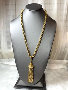 Wonderful vintage Monet necklace with a very nice chain tassel dangling from a filigree ball, it's has a decorative fold over clasp signed Monet with the copyright symbol on the back. The chain measure 24" long and the removable  tassel approximately 4" long including the bail This necklace is circa 1960's and is superior workmanship indicative of Monet jewelry "Monet the master of jewelers"  Excellent vintage condition. Please contact me with any questions you have  Thank you for stopping by. Copyright Symbol, Book Pieces, Monet Jewelry, Vintage Monet, Rope Chain, Tassel Necklace, Tassels, 18k Gold, Jewelry Necklaces