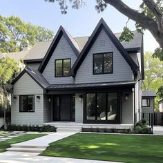 a house that is gray and has black trim