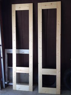 two wooden doors sitting next to each other