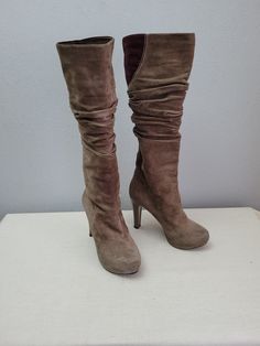 Vintage brown suede tall knee slouchy boots with creased, wrinkled design for women. Dark red patches on the back top. Platform pull on boots. Decorative wrinkled boots. Made in Italy. Lining - leather inside. condition: used, normal vintage condition. Some signs of use.   measurements: Heels height 11 cm / 4.3" in Outsole length 27 cm / 10.5"in total height with heel 51 cm / 19.9 in bootleg top circumference 38 cm / 14.8" in bottom sole width in widest place 7.5 cm / 2.9" in SIZE: EU 37 - label Slouch Boots, Women High Heels, Red Patch, Slouchy Boots, Slouched Boots, Pull On Boots, Vintage Brown, Womens High Heels, Brown Suede