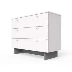 a white dresser sitting on top of a wooden floor