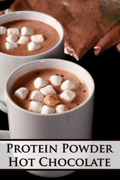 two mugs of hot chocolate with marshmallows in them and the words protein powdered hot chocolate