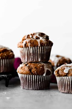 several muffins with icing on top of each one