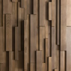 the wooden wall is made up of squares and rectangles