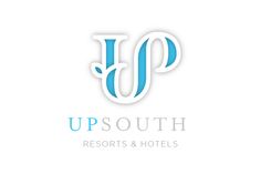 the logo for up south resort and hotels