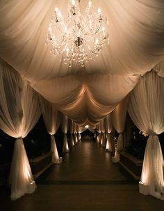 an image of a wedding venue setting with chandelier