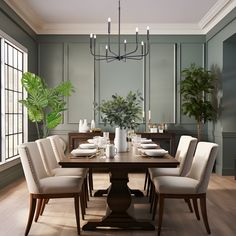 a dining room table with white chairs and a potted plant in the corner next to it