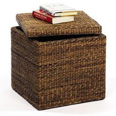 a wicker box with a book on top