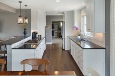 the kitchen is clean and ready to be used as a dining room or living room