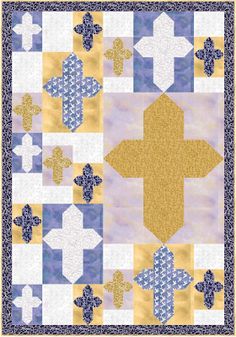 a yellow and blue quilt with crosses on it