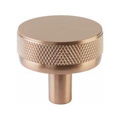 an image of a round knob in brass finish with diamond pattern on the front and sides