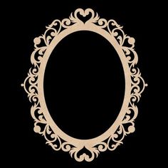 an oval wooden frame with ornate designs on the edges, and a heart in the middle