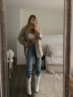 Bodysuit With Cowboy Boots, White Cowgirl Boots With Jeans, Sand Cowboy Boots Outfit, Cowgirl Boots And Blazer Outfit, Western Boots And Jeans, Cowboy Boots Outfit Beige, Cowgirl Boots Outfit With Jeans, Ripped Jeans And Cowboy Boots, White Cowboy Boots With Jeans