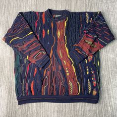 Vintage 90s Coogi Abstract Design Designer Handmade Textured Pattern Basic Essential Multi Color Knit Sweater Medium Mens *X4 Condition:  Excellent Used Condition  = No Flaws Measurements: Please see photos above for all measurements IF YOU BUY TWO OR MORE ITEMS USE THE CODE BUNDLE @ CHECK TO SAVE 20% WE SHIP WITHIN 24 HOURS AFTER PURCHASE! Please be aware that we do not offer free returns!! The Buyer is responsible for the cost of the return label.  Follow us on TikTok & Instagram @findsnostalgic and tag us in your finds 90s Sweater Men, Multicolor 90s Sweater For Winter, Men’s Vintage Sweaters, Vintage Coogi Sweater, Vintage Multicolor Hand-knitted Sweater, Streetwear Ideas, Knit Sweater, Abstract Design, Sweater Outfits