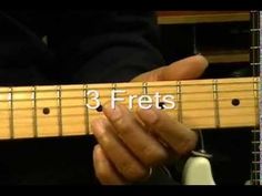 a person playing an electric guitar with the words fret 5 - 7