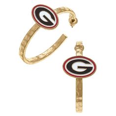 Showcase your Bulldogs pride with these Enamel Logo Hoop Earrings! The classic worn gold hoop features the team-colored enamel logo charm. DETAILS: * Base Metal with Worn Gold Plating * Enamel Material * Post-Back Closure * 1.5" Diameter * NCAA Officially Licensed Baby Bubble Romper, Bonnet Cap, Baby Bubble, Bubble Romper, Georgia Bulldogs, Earrings Black, Romper Dress, Garment Bags, Hair Accessories Jewelry