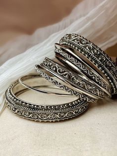 #oxidizedjewelry #oxidizejewellery #bangles Oxodise Jewellery Bangles, Garba Bangles, Unique Jewellery Designs, Oxidised Jewellery Bangles, Oxidised Jewellery Indian Outfit, White Bangles Set, Oxidised Jewellery Indian, Jwellary Unique, Desi Bangles